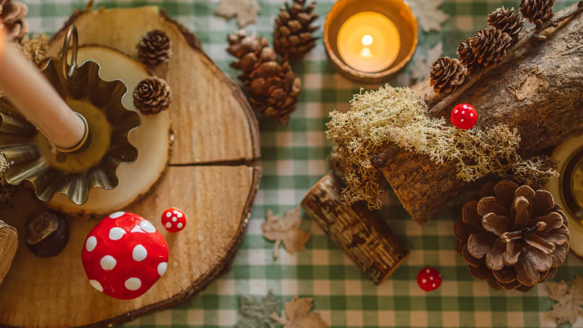 Rustic candle display with pinecones and tealight